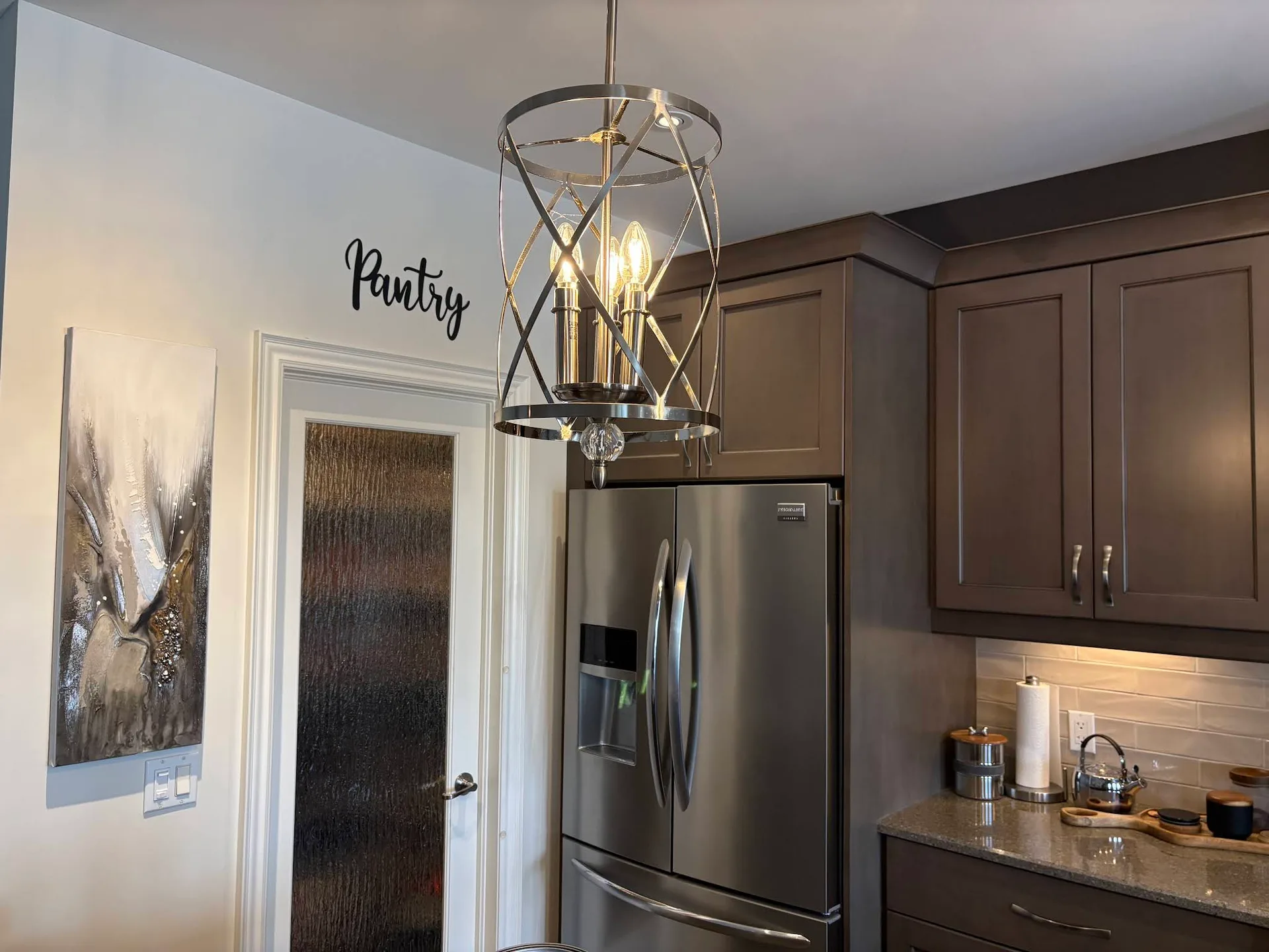 Kitchen and dining walls painted in coordinated neutral tones