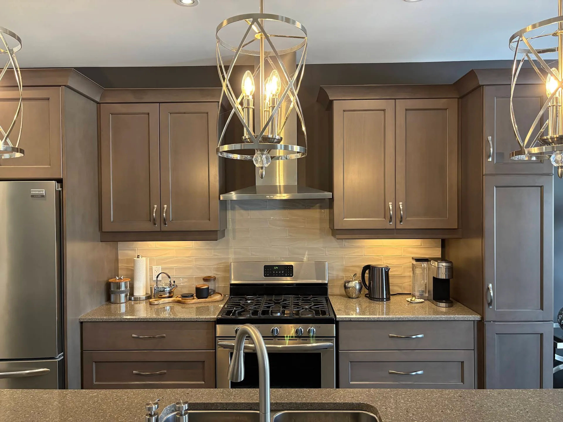 Kitchen cabinetry framed by freshly painted walls and ceiling