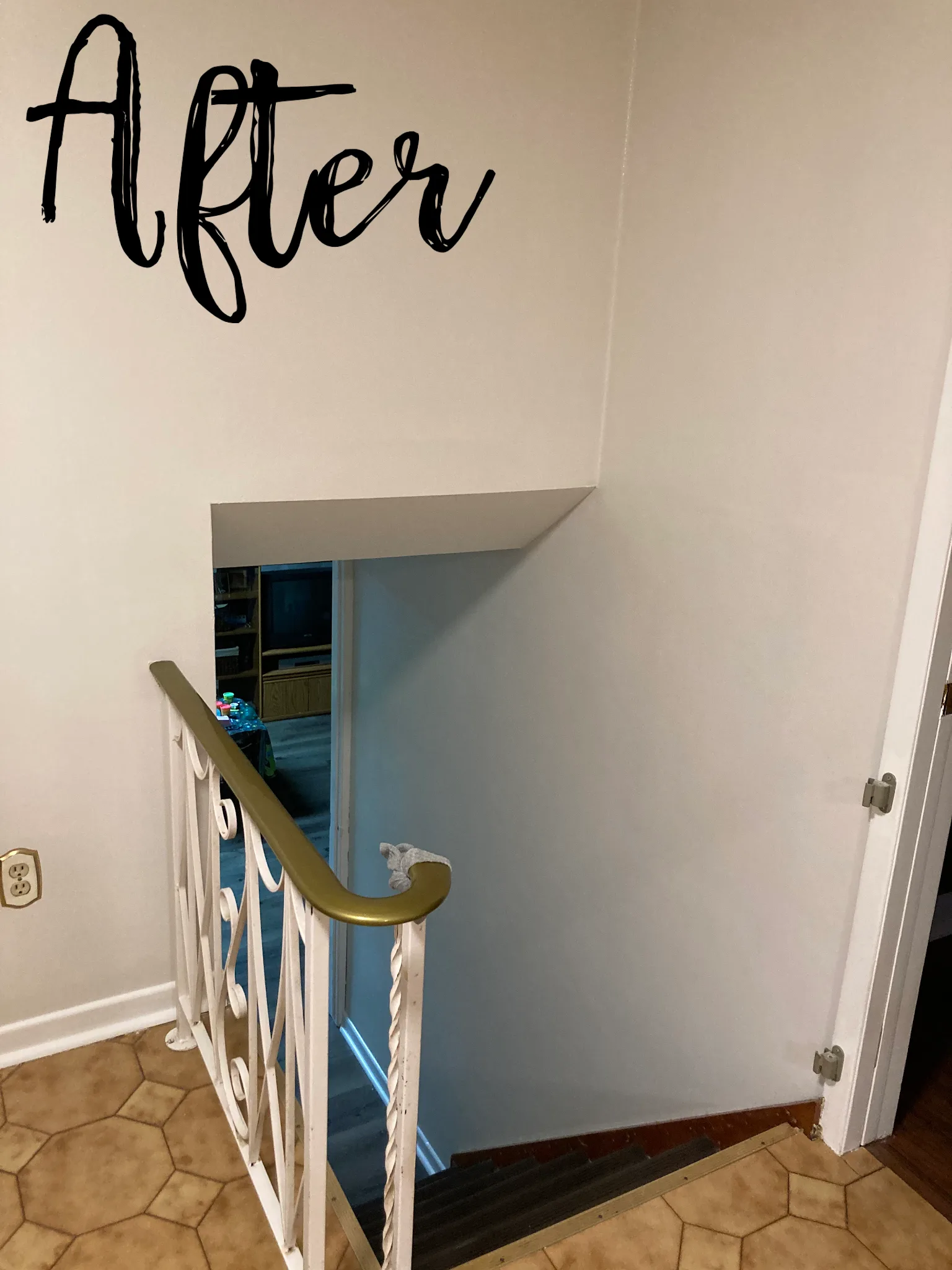 Stairwell with bright neutral walls after repainting